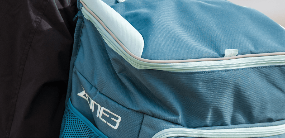Close up of a teal triathlon transition bag pack