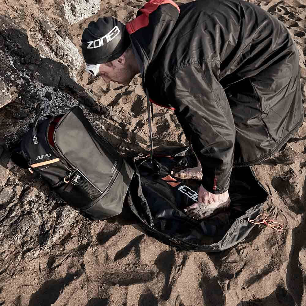 A Zone3 wetsuit changing mat and bag on a white background.