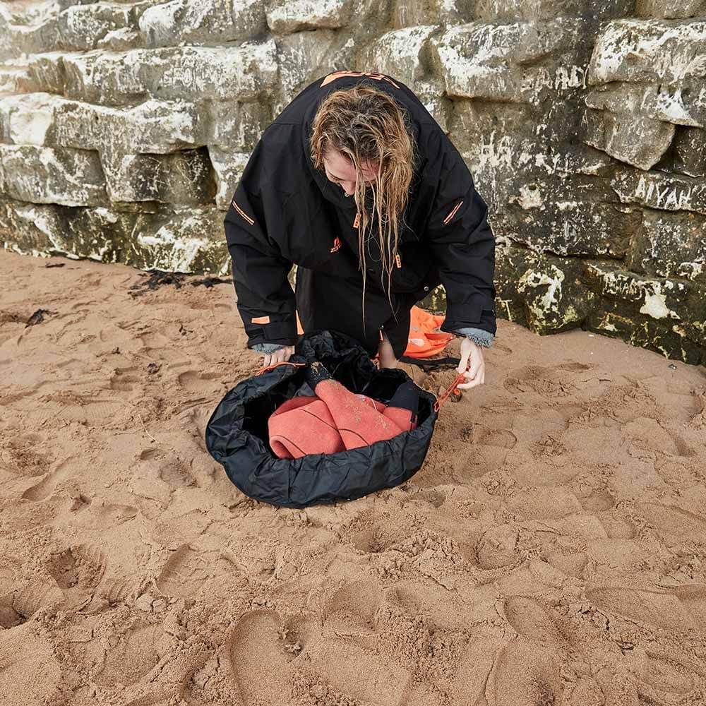 A Zone3 wetsuit changing mat and bag on a white background.
