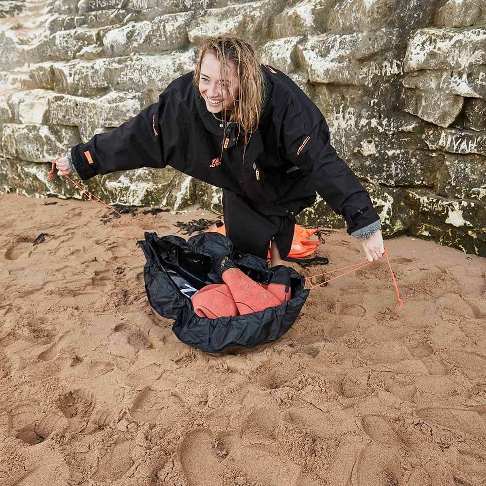 A Zone3 wetsuit changing mat and bag on a white background.